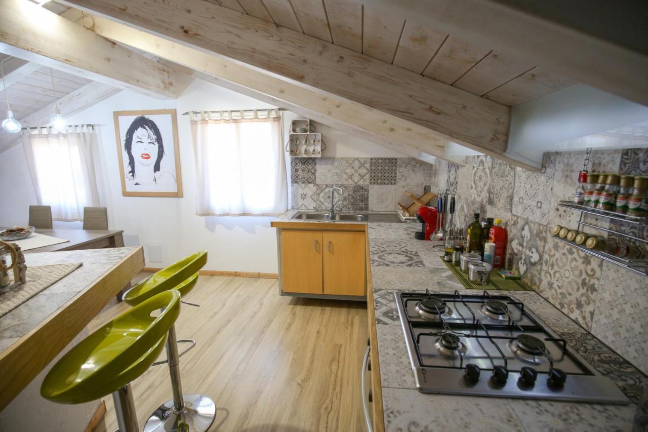 Holiday home Mansarda Daila